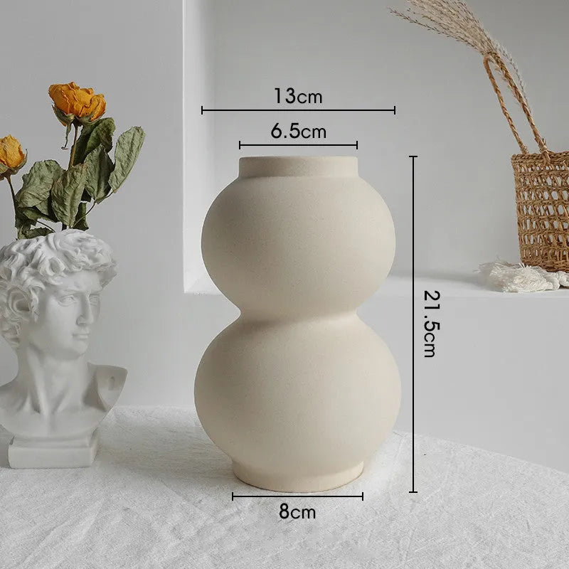 Matte ceramic dry flower vase with textured surface in Nordic style
