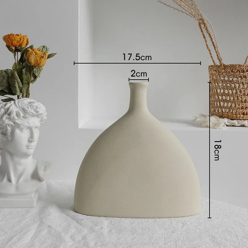 Matte ceramic dry flower vase with textured surface in Nordic style