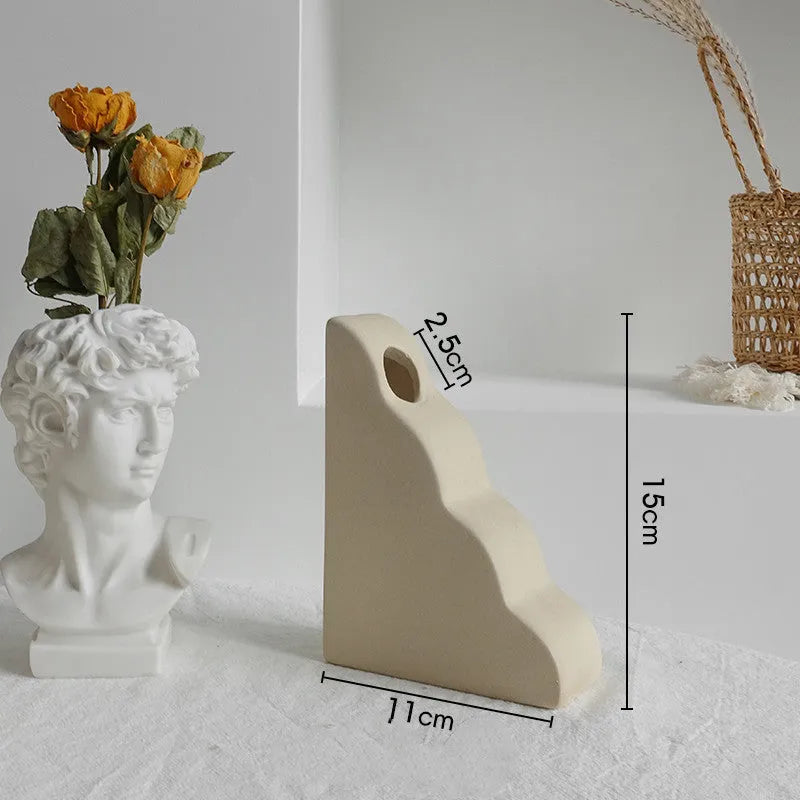 Matte ceramic dry flower vase with textured surface in Nordic style