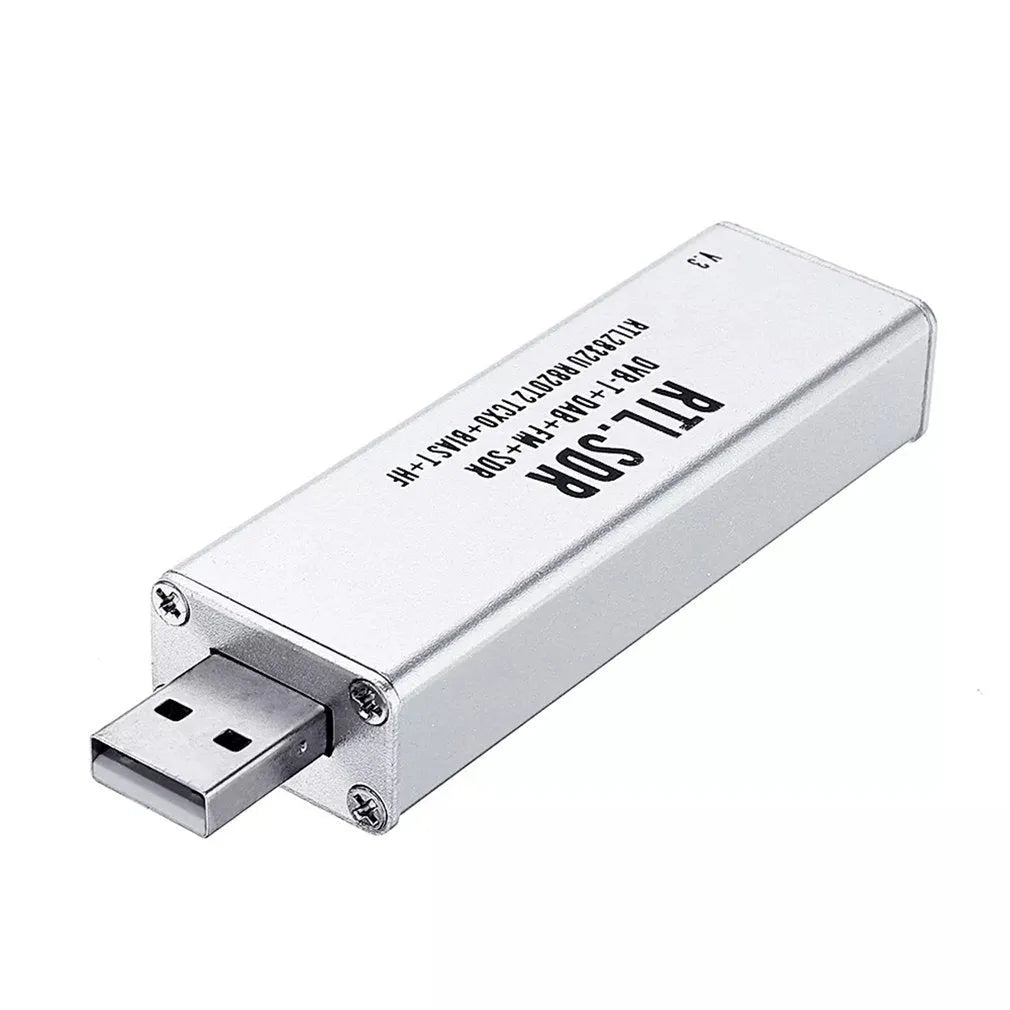 Black all-band software-defined radio receiver with golden SMA connector for computer-based signal reception.