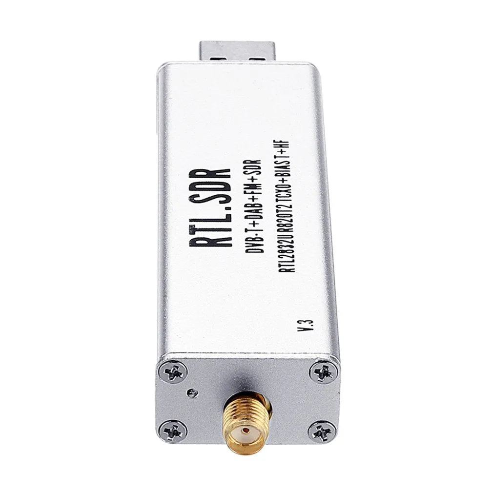 Black all-band software-defined radio receiver with golden SMA connector for computer-based signal reception.