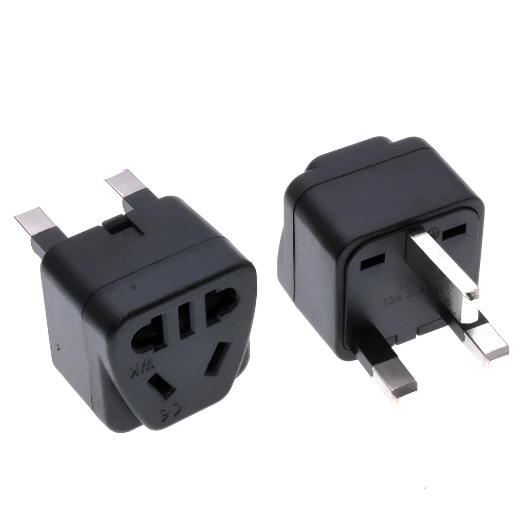 Square white international plug adapter with five outlets and a UK three-pin plug.