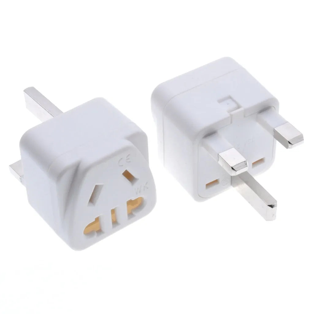 Square white international plug adapter with five outlets and a UK three-pin plug.