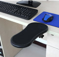 Black rotating computer hand bracket wrist pad showing 180-degree adjustment on desk