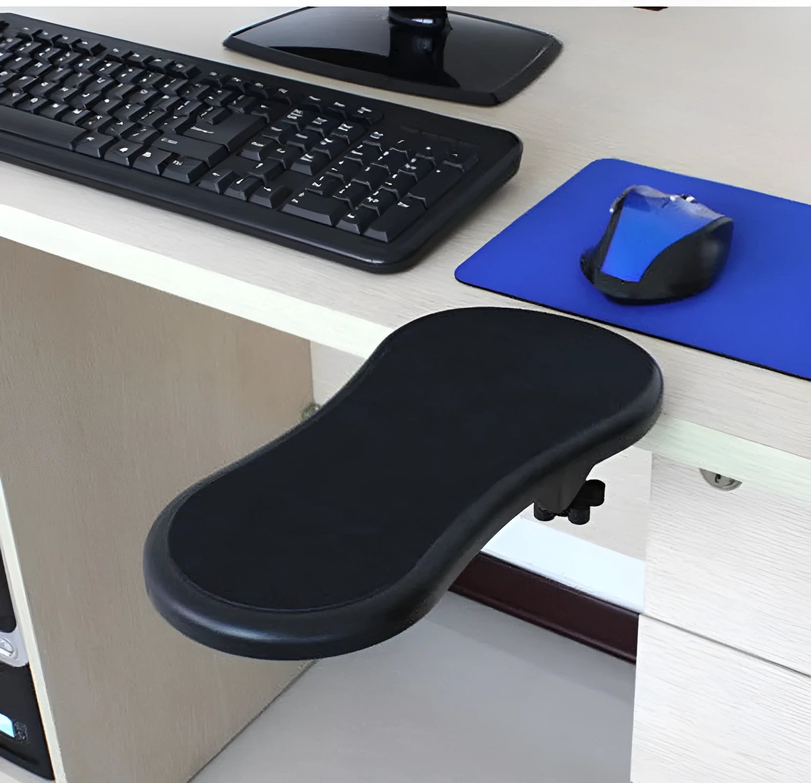 Black rotating computer hand bracket wrist pad showing 180-degree adjustment on desk