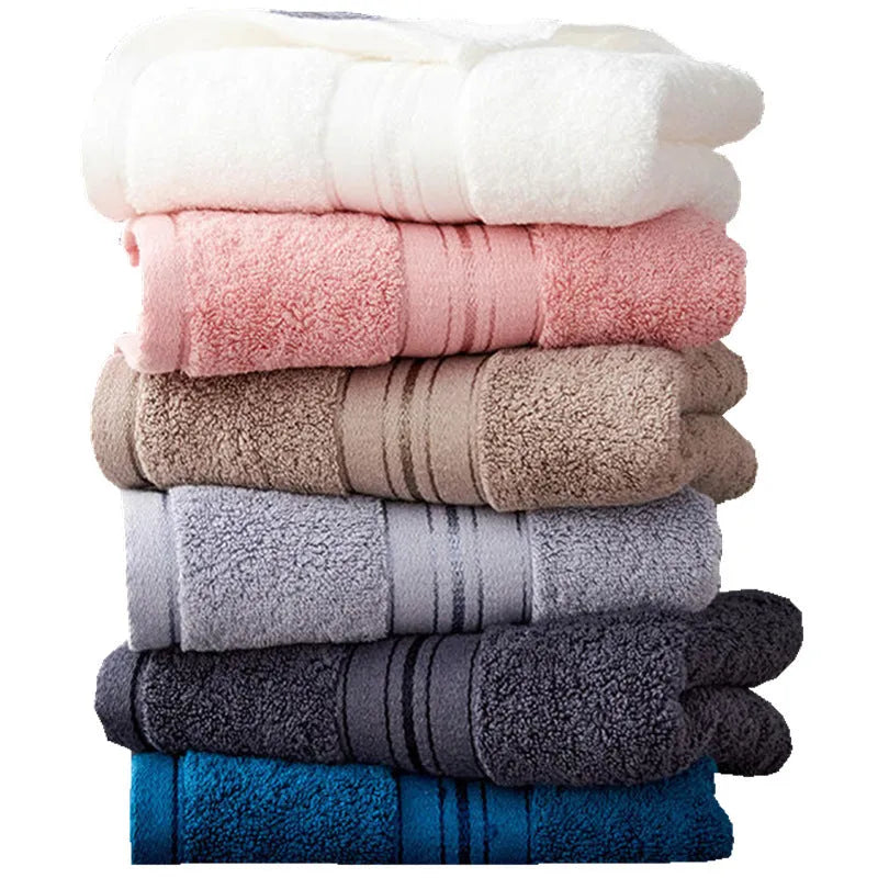 Pure cotton three-piece towel set showing bath towel, hand towel, and square scarf in flower pattern colours