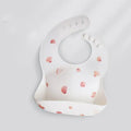 Pink baby waterproof silicone feeding bib with deep pocket and white daisy pattern