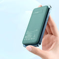 Maiduo MagSafe magnetic wireless power bank in mint green, showing clip and dimensions.