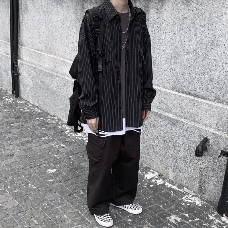 Retro wild striped black long sleeved loose shirt with square collar, front view on model