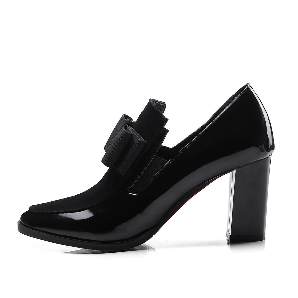Large size black patent leather women's high heels with a thick super high heel and square toe.