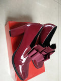 Large size black patent leather women's high heels with a thick super high heel and square toe.
