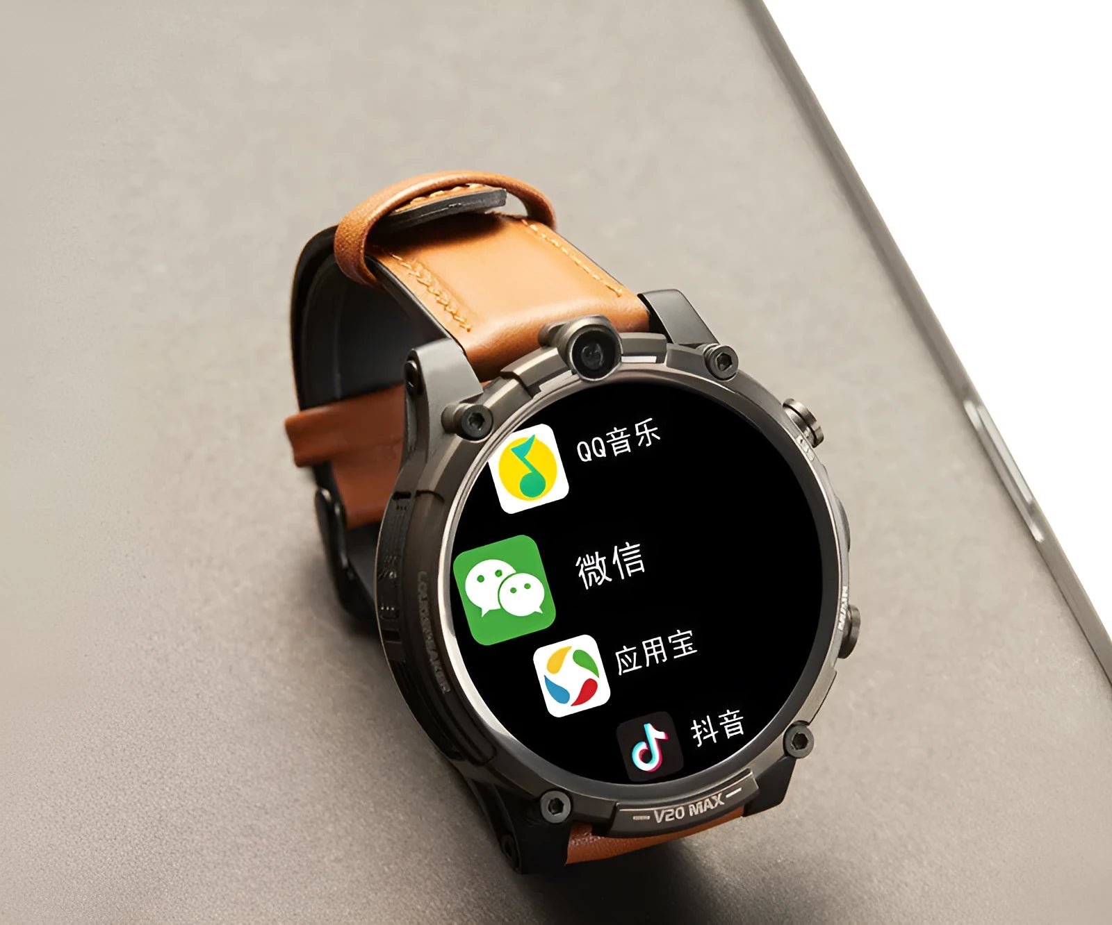Black adult 4G smartwatch with touch screen, dual cameras, and wrist strap on a person's arm.