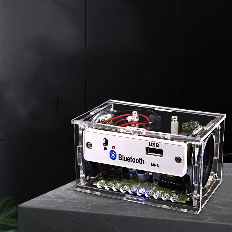 Bluetooth speaker DIY electronic kit with loose components and transparent housing for assembly