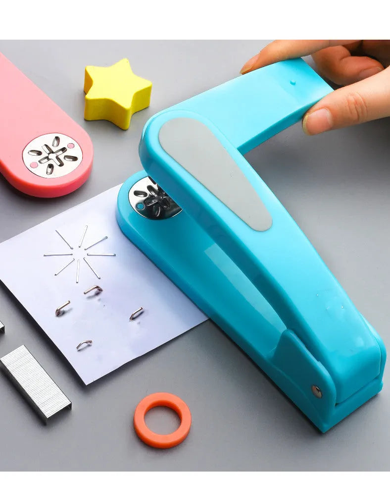 A rotatable student stapler with a 360° spinning head, shown in blue on a desk with papers.