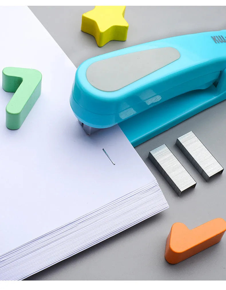 A rotatable student stapler with a 360° spinning head, shown in blue on a desk with papers.