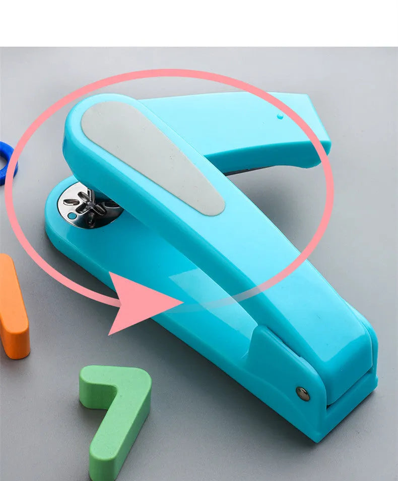 A rotatable student stapler with a 360° spinning head, shown in blue on a desk with papers.