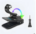 Silver and black rotating backpack clip mount for GoPro and other action cameras showing 360-degree swivel mechanism.