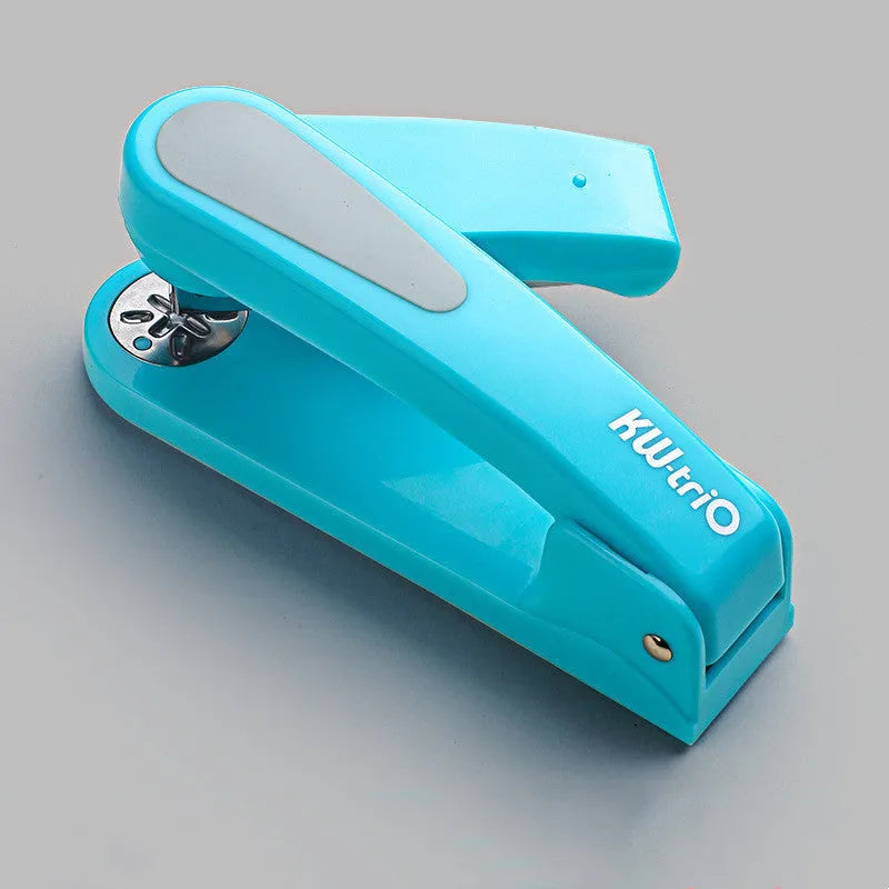 A rotatable student stapler with a 360° spinning head, shown in blue on a desk with papers.