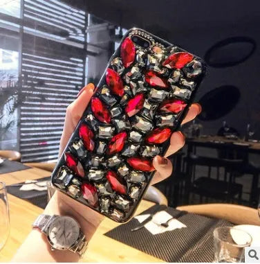 Clear TPU iPhone case with decorative rhinestones on back cover showing black colour option