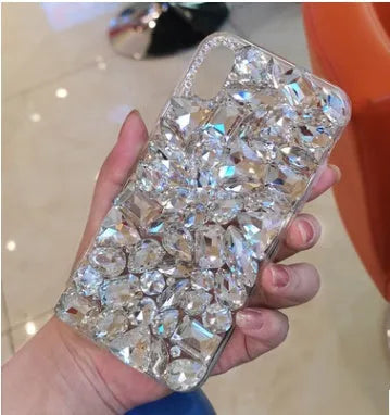 Clear TPU iPhone case with decorative rhinestones on back cover showing black colour option