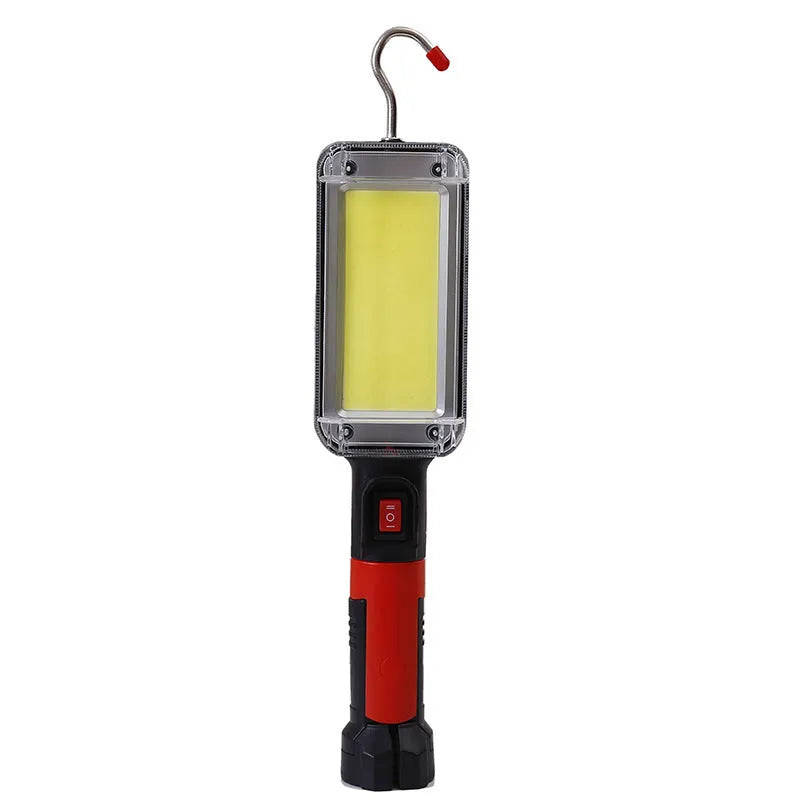 Portable black flashlight with magnetic base and USB charging port
