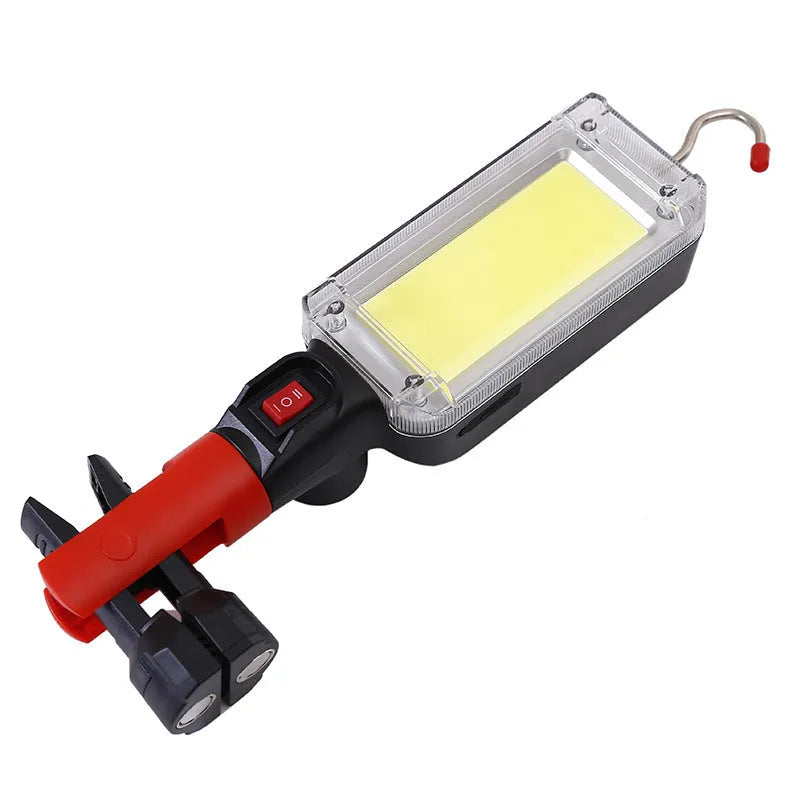 Portable black flashlight with magnetic base and USB charging port