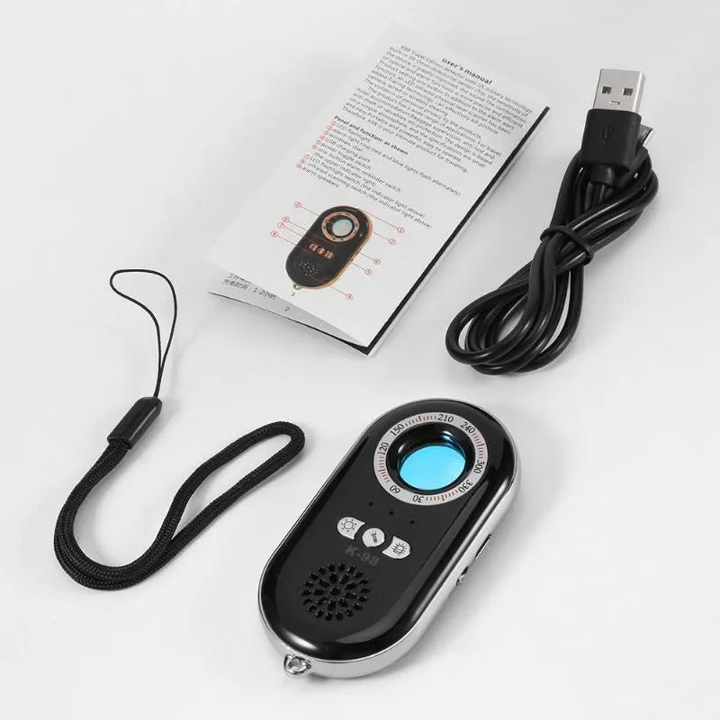 Compact black wireless vibration detector alarm with dimensions 85mm by 40mm.