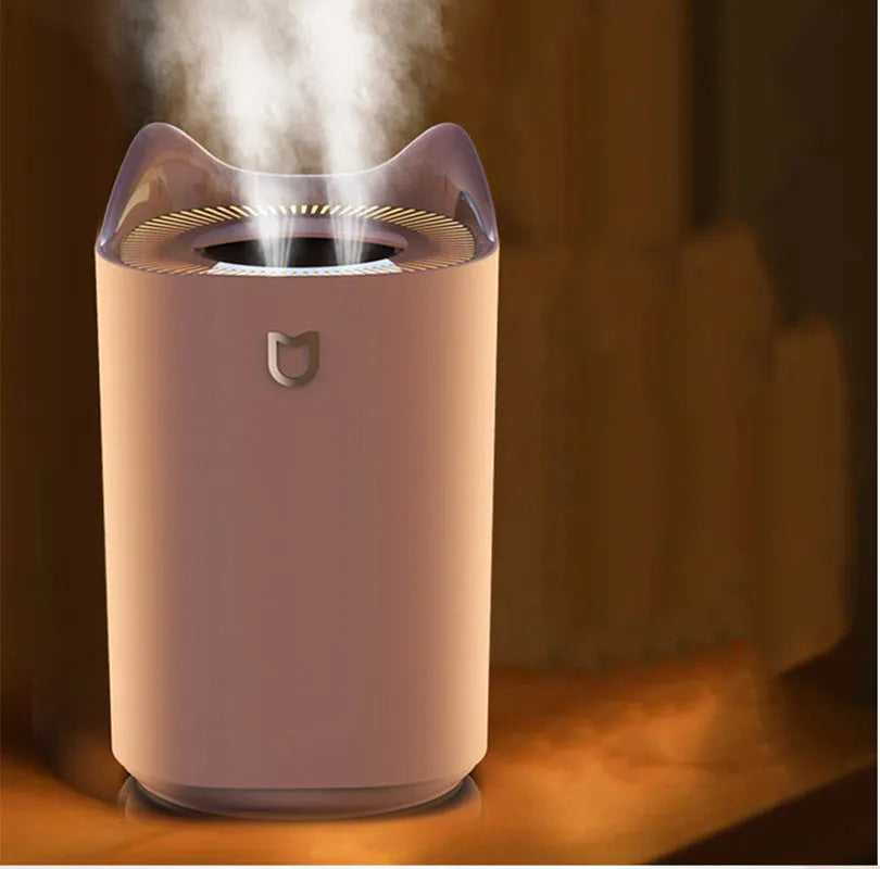 Coral Pink double spray humidifier with three fog outlets and USB cable.