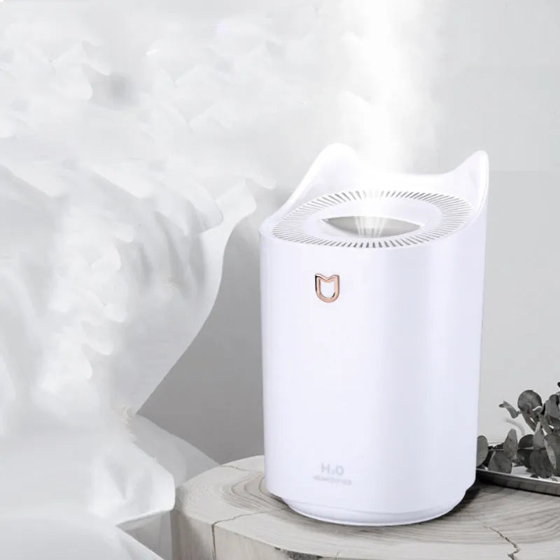 Coral Pink double spray humidifier with three fog outlets and USB cable.