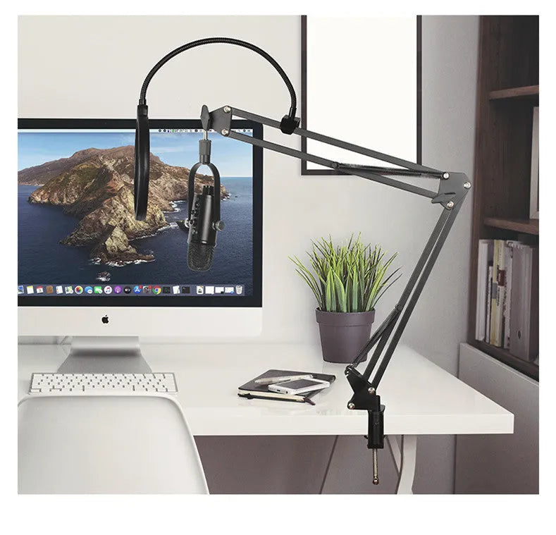 Black BM-86PRO USB condenser microphone on a metal stand with a sponge cover.