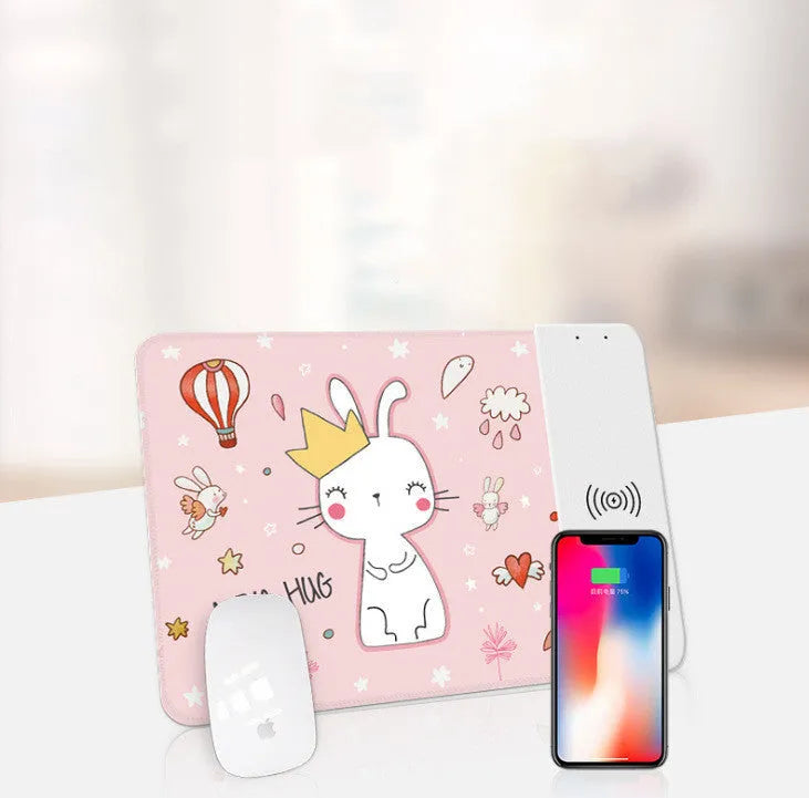 Cartoon design wireless charging mouse pad with RGB edge lighting on a desk
