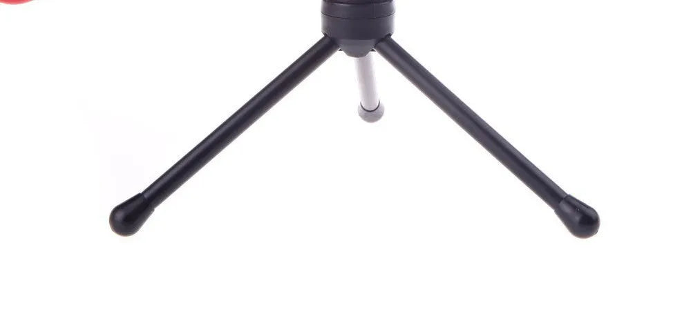 Black wired PC microphone with a detached desktop stand holder and a long cable.