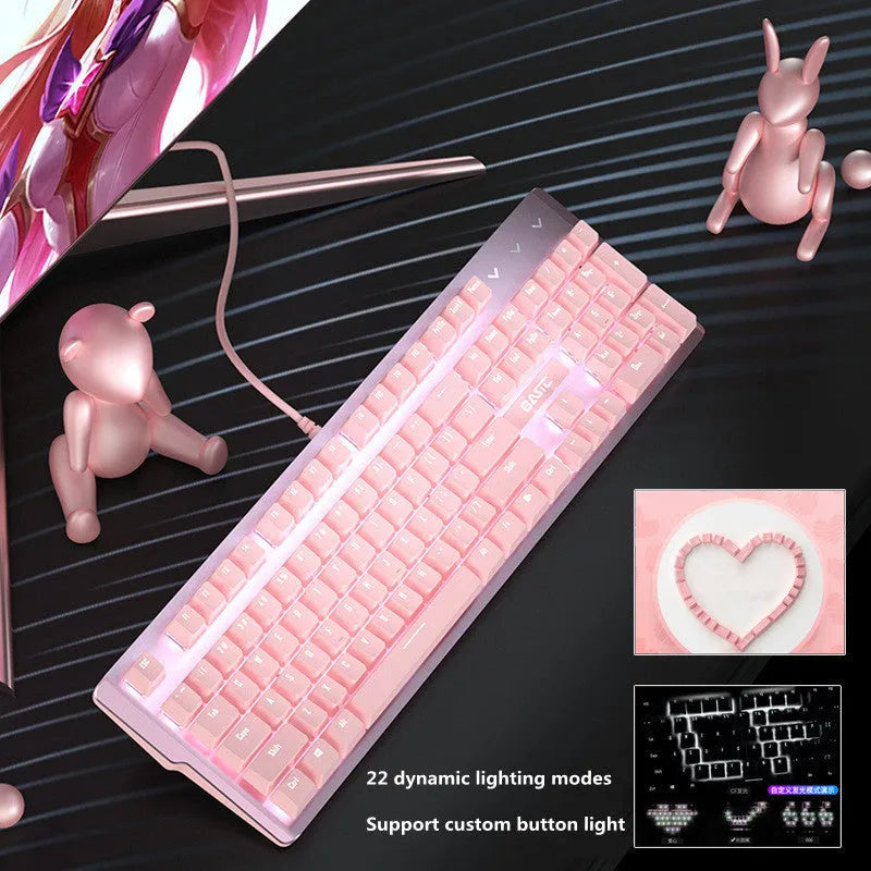 Pink wired mechanical keyboard and matching mouse with green axis switches for gaming.