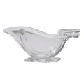 Transparent acrylic manual lemon juicer with bird-shaped design on a kitchen counter