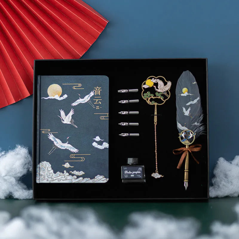Chinese feather pen set with metal sheath containing 36 pens in four colours alongside Jianhegui notebook
