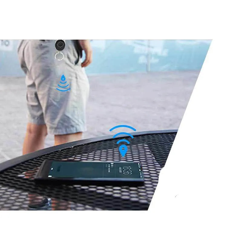 Black Bluetooth anti-lost tracker with keychain attachment compatible with Apple devices