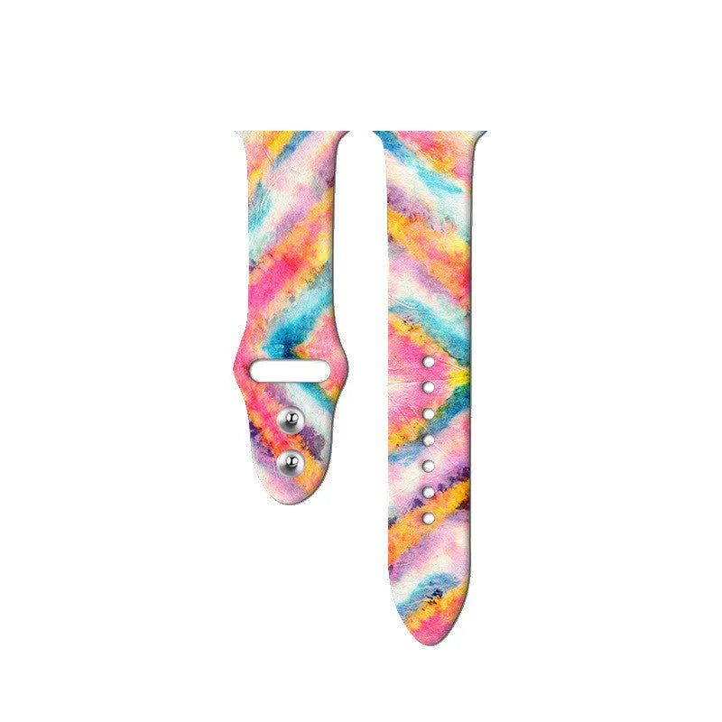Colourful tie-dye patterned silicone strap for Apple Watch with adjustable buckle.