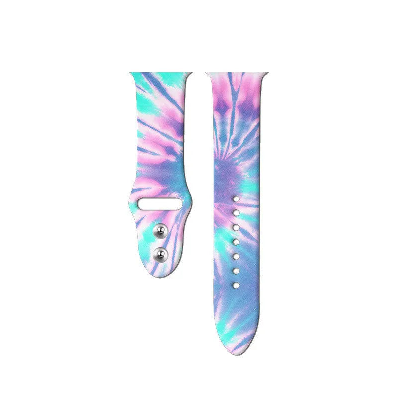 Colourful tie-dye patterned silicone strap for Apple Watch with adjustable buckle.