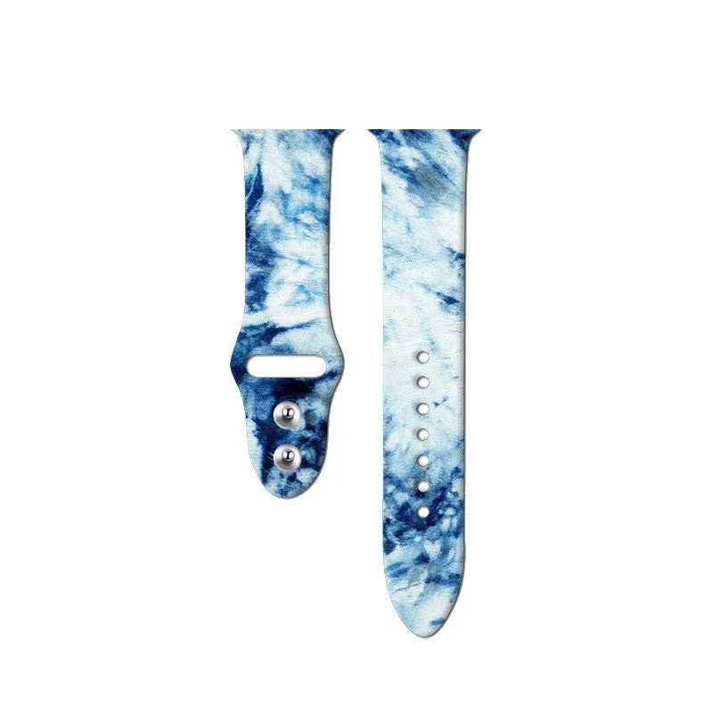 Colourful tie-dye patterned silicone strap for Apple Watch with adjustable buckle.