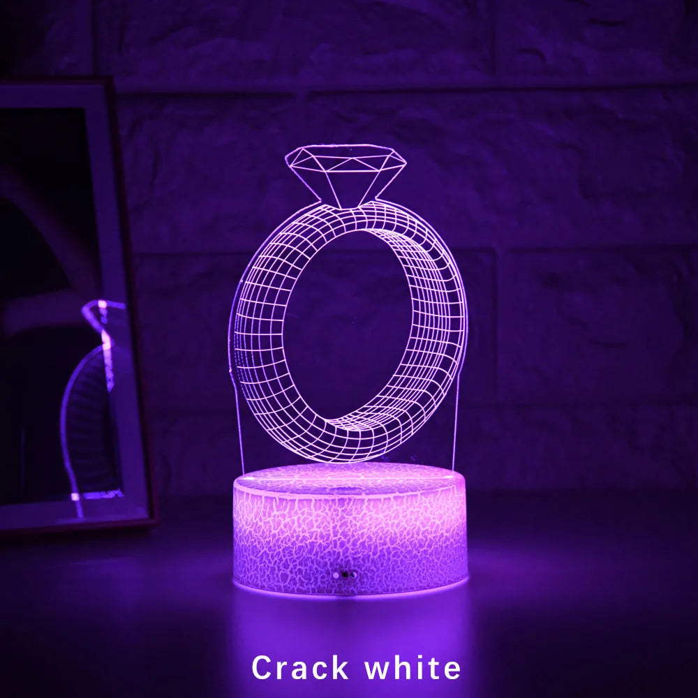 3D diamond ring LED night light with laser engraved acrylic panel showing colour changing illumination