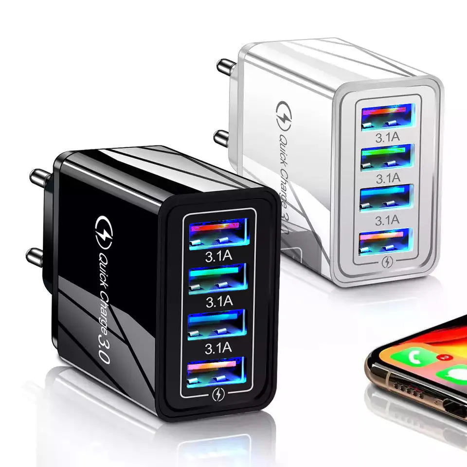A 4-port USB wall charger with a luminous light, shown in dark blue, next to a mobile phone.
