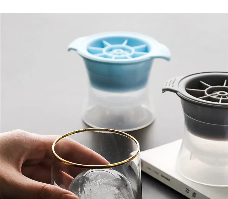 Silicone ice tray showing hockey puck, round, and pentagon shaped moulds in various colours