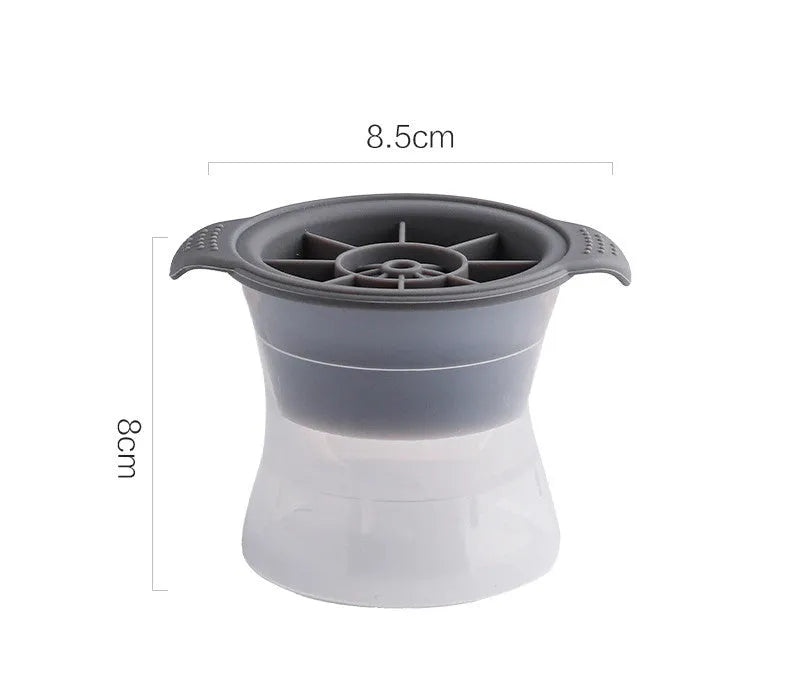 Silicone ice tray showing hockey puck, round, and pentagon shaped moulds in various colours