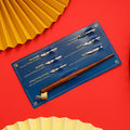 Black and brown calligraphy dip pen with a card of six stainless steel nibs for comic art.
