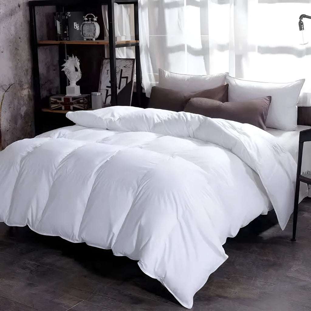 Goose down winter duvet core in twill fabric, shown in various colour options on a bed.