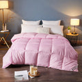 Goose down winter duvet core in twill fabric, shown in various colour options on a bed.