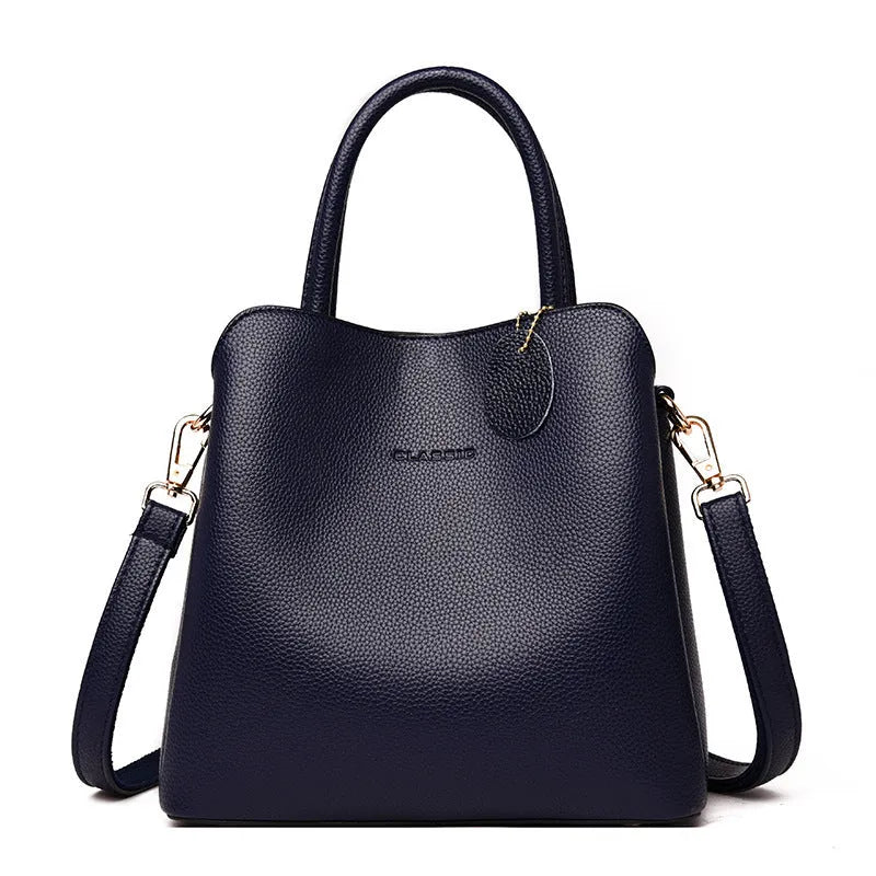 Women’s casual medium bucket bag in soft PU with litchi pattern, zipper closure, and soft handle in khaki