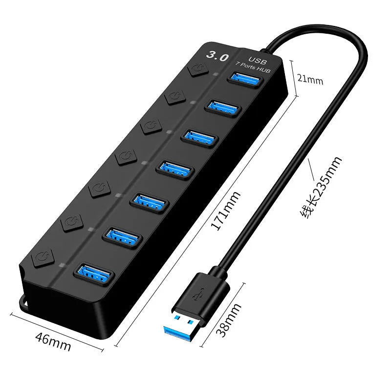 Black seven-port USB 3.0 hub with external power adapter on a desk.