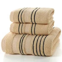 Pure cotton bath towel set showing large bath towel and two matching hand towels in available colours