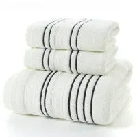 Pure cotton bath towel set showing large bath towel and two matching hand towels in available colours